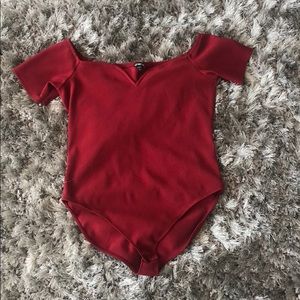 Red off the shoulder body suit